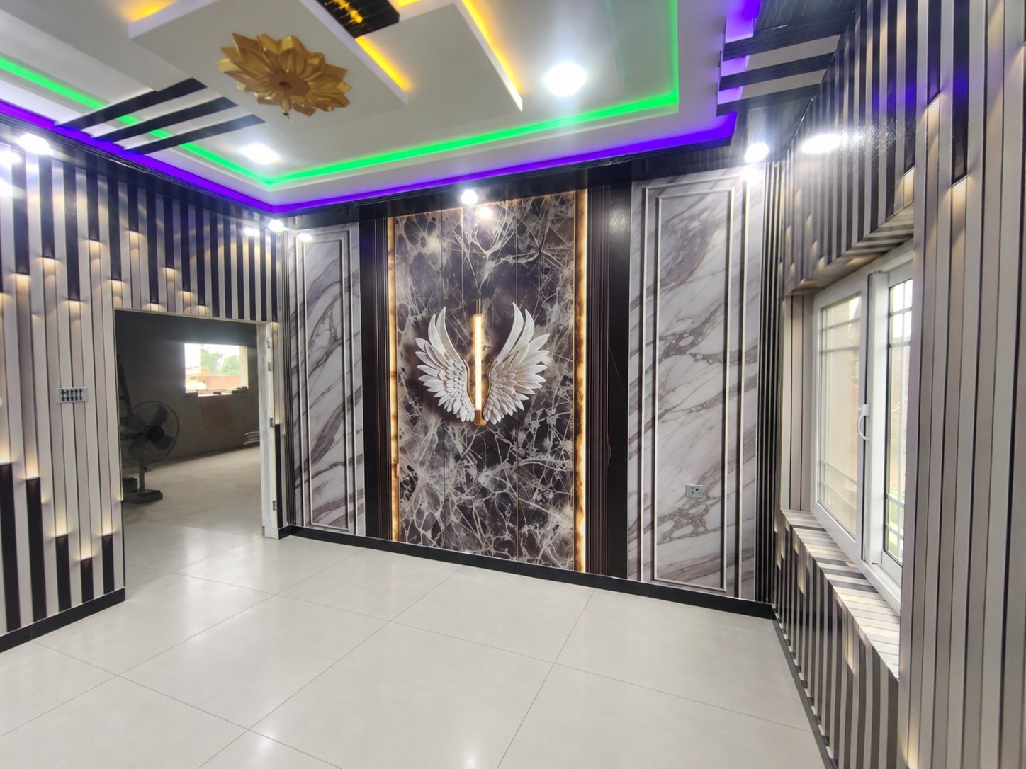 Room decorated with 3D flex wallpaper, fancy ceiling and wings wall art installed by PRINT POINT